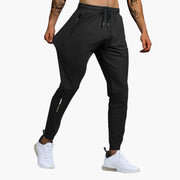 Adrián | Pantalón Deportivo Hombre Running Bolsillos Cremallera