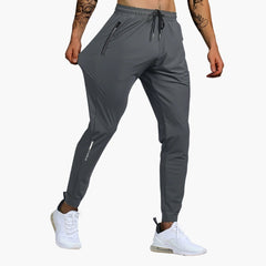 Adrián | Pantalón Deportivo Hombre Running Bolsillos Cremallera