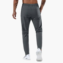 Adrián | Pantalón Deportivo Hombre Running Bolsillos Cremallera
